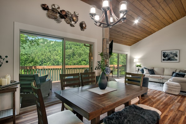 Dining and living room both with beautiful lake views.