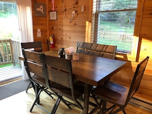 Dining area- where you may see deer or rabbits in the fields around the Cabin.