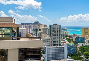 This penthouse unit (PH601) is on the 44th floor with a roof top bedroom suite which is one of the tallest points in Waikiki!