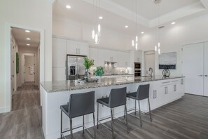 HUGE KITCHEN ISLAND WITH SEATING FOR 6