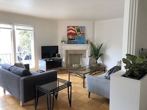 Living Room can comfortably seat 5 people. It gets great natural light.