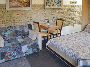 living area with un-folded double bed | Stone House Farm - The Old Stables - Stone House Farm , Lessingham, near Stalham