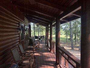 Front porch with rocking chairs, wonderful spot to sit and listen to the rain.