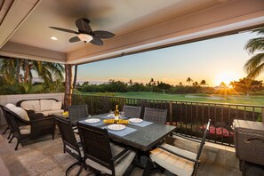vWatch the sun set from the private covered lanai