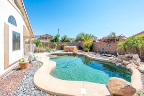 Private backyard with swimming pool, BBQ, and outdoor patio. Pool Heating optional,  fee required 