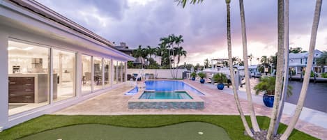 Waterfront pool, hot tub, & putting green.