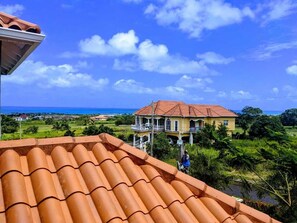 View of the surrounding neighborhood and the Caribbean Sea.