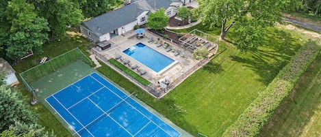 The estate features a private large, newly refinished tennis court.