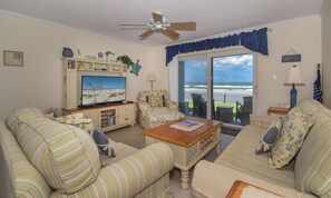 Large living room with seating for 6 and HD TV