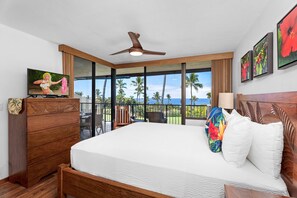 Primary bedroom with cal-king bed and an ocean view!