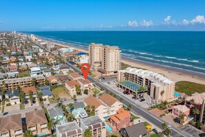 Aerial view of the property. Located right across the street from the beach!