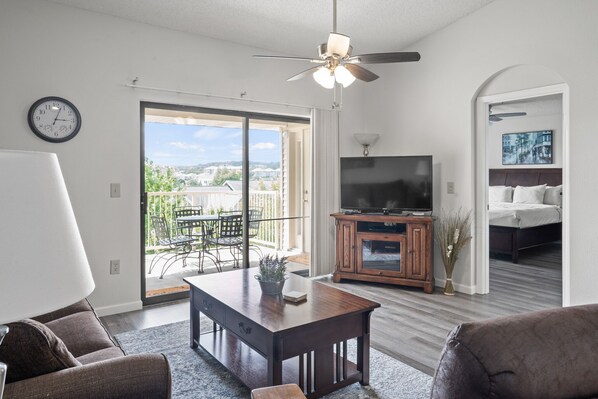 The Living Room features Balcony Access, Cable TV/DVD, and a Sofa Bed