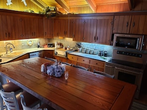 Kitchen double sink, dishwasher, griddle, stove/double oven