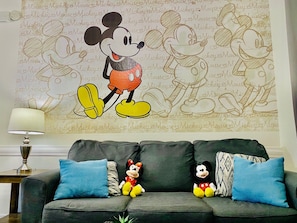 Relax after a long day in the backdrop of classic Mickey. 