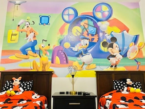 The beautiful kids room is decorated Mickey clubhouse themed for all ages. 