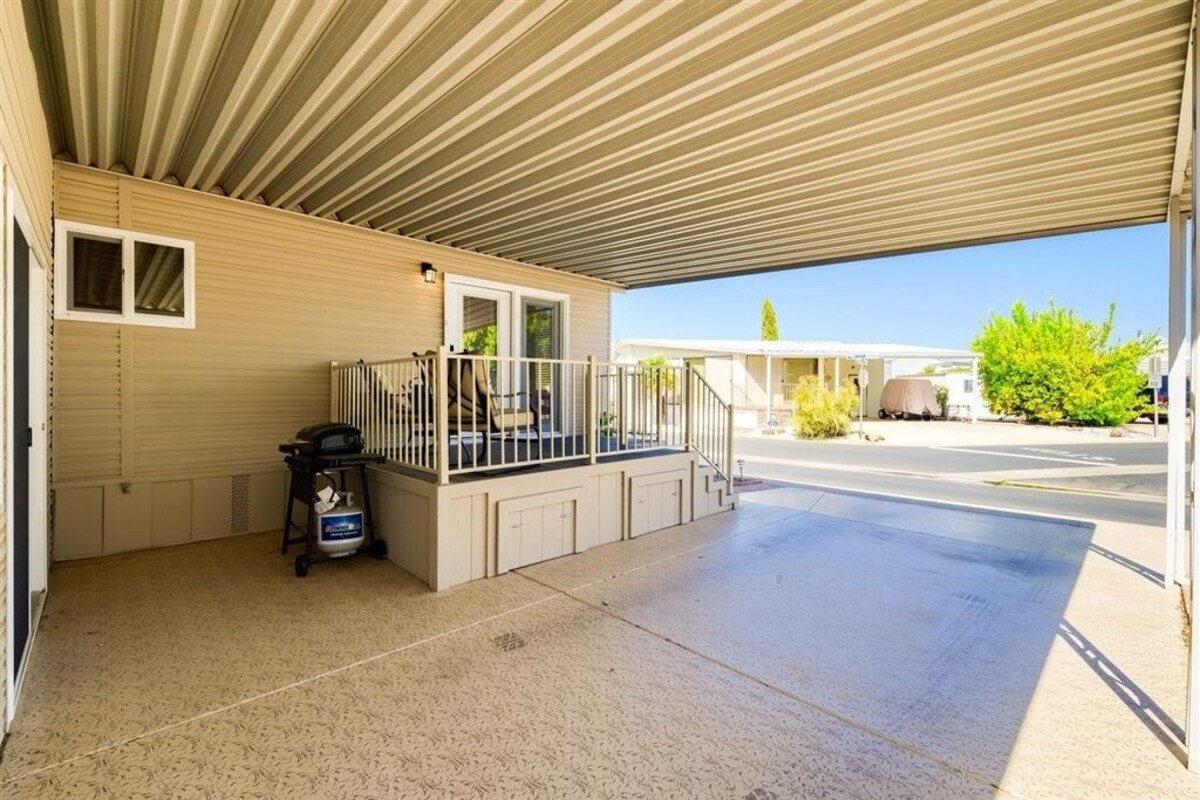 Resort Living in this fully remodeled park home in Carriage Manor