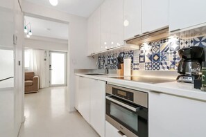 Experience gourmet living at the beautifully-designed kitchen of 250 Collins