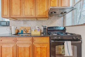 Kitchen equipped with essential cookware