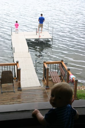 fishing off the pier and a little one wishing he was out there too