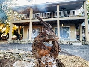 Signature fish sculpture in front of our home