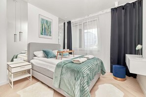 Comfortable double bed in the bedroom. 
