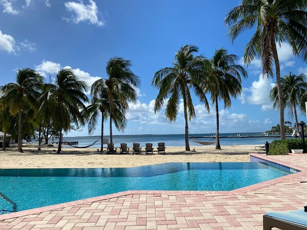 Our pool and hot tub overlook the gorgeous Caribbean Sea 