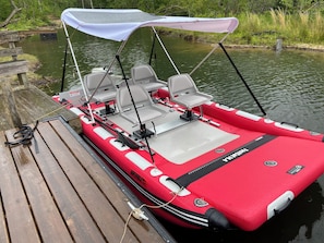 Take out the Sea Eagle boat w electric motor and explore Bald Mountain Lake.