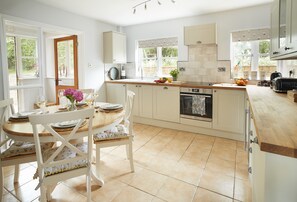 Ground floor: Kitchen with table and four chairs