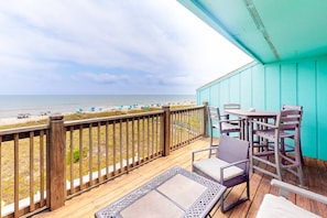 Sit outside and enjoy the views on this oversized porch with sitting area and new dining table and chairs