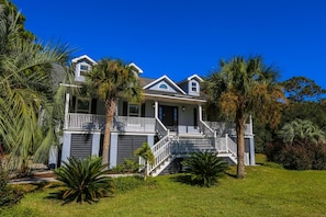 Sugar Magnolia is an elevated home with a large front porch.