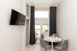 Modern television with cable channels, which allows the guests to enjoy their favourite programs.