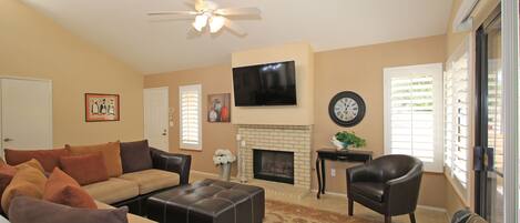 Living Room w/TV and Fireplace