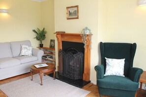 3 seater settee, 2 chairs, smart tv - unfortunately the fire is not operational 