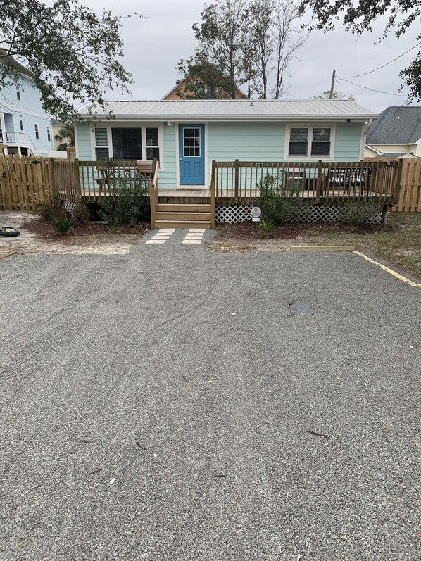 Bungalow 1 block from the beach.  Room for 2-3 cars and even a boat trailer. 