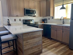 Fully stocked kitchen. 