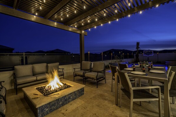 Roast marshmallows poolside with a gorgeous fire pit area