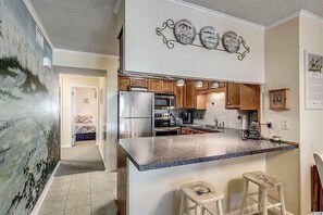 Eat in bar between kitchen and dining area. 