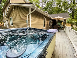 Enjoy the large hot tub out on the deck