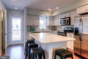 Kitchen with counter seating for 4