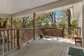 Have a quiet swing on the deck's porch swing! It's the perfect place for relaxation and wildlife watching.