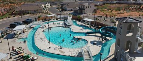 Community pool, lazy river, spa, and slide