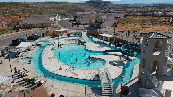 Community pool, lazy river, spa, and slide