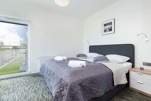 Bedroom of Pięć Mórz Lotnicza 1I/20 apartment with double bed