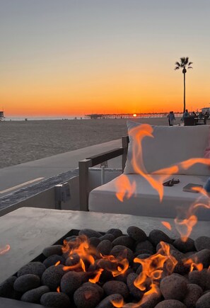 Fire pits, sand, ocean and the most incredible sunset views!