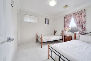 Bedroom 3 with its own walk in wardrobe