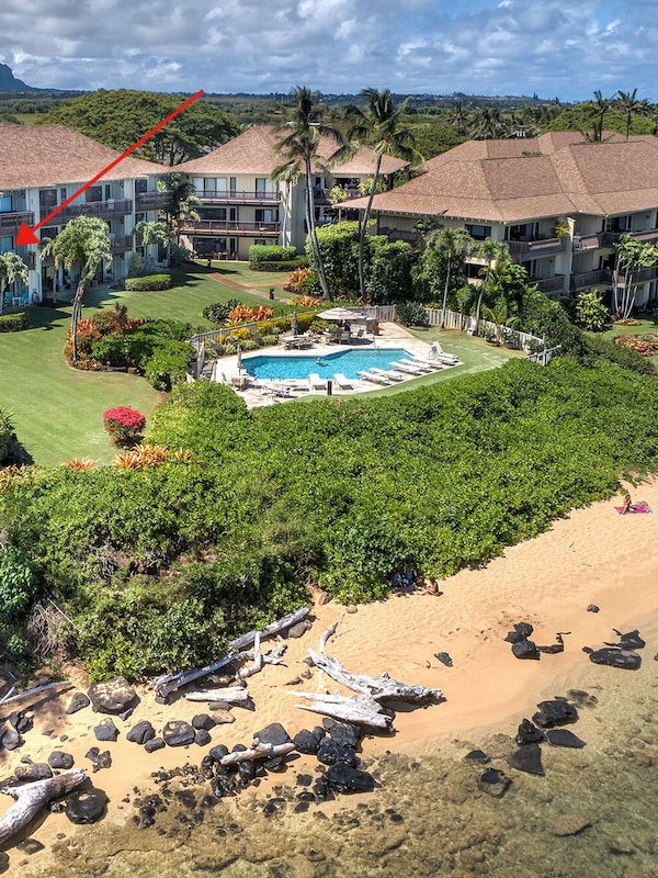 Condo overlooks the pool and Pacific Ocean