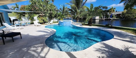 Heated Tropical Pool: 4 lounge chairs, Dining table with chairs and Coffee area