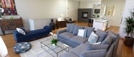 Light and airy living space with open floor plan. This opens to the front patio