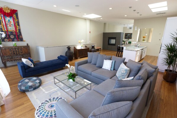 Light and airy living space with open floor plan. This opens to the front patio 
