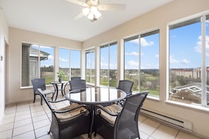 All-Season Sunroom with Course View